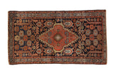 Vintage Fine Mehriban rug featuring a shield medallion, serrated leaves, navy, madder root, ivory.