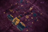 Plum-aubergine pile with pale gold vases and navy blossom vines.