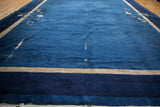 Vintage Peking carpet border: indigo blue and antique ivory stripes with visible foundation.