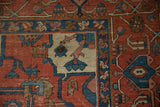 Antique Serapi rug corner detail with navy blue turtle samovar border and palmettes.