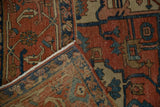 Antique Serapi rug's folded corner shows madder root red pile, polychromatic selvage, and woven foundation.