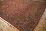 Madder root red field of vintage Mahal carpet with scrolling leaves and Samovar border.