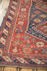 Low-pile texture of the geometric boteh motifs along the border of an antique Afshar rug.
