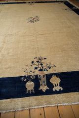 Vintage Peking rug's cobalt blue border with inwardly directed pictorial vases and blossoms.