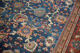 Vintage Mahal carpet with sapphire blue Harshang design and detailed red patterned border.