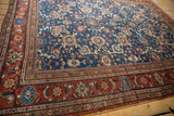 Vintage Persian Mahal carpet's madder red border with floral vinery and arabesques.