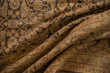 Distressed vintage Sivas carpet detail with brown Herati pattern and classic Turtle Samovar border.