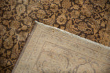 Vintage distressed Sivas carpet showcasing Herati pattern texture and woven foundation.