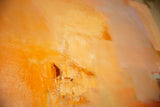 Textural acrylic brushstrokes in warm orange, yellow, and peach hues.