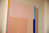 Angled view showing the deep painted edge and textured acrylic surface of the artwork.