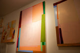 Angled view of abstract Colorblock No. 13 painting displayed with other contemporary artworks.