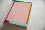 Textured impasto pink acrylic paint with vivid blue, green, and gold color blocks.