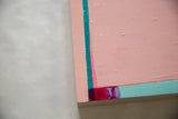 Close-up of textured pink, teal, and magenta color blocks on the abstract painting corner.