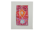 A fine art print of a vintage rug with an orange medallion on a vibrant red and pink geometric field.