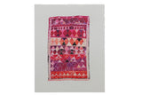 Sarah Martinez art print of a vintage rug with pink, red, and purple geometric patterns.