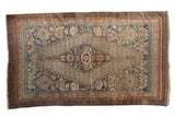 Distressed Bibikabad carpet with diamond medallion, intricate palmettes, muted teal and earth tones. 6x10.