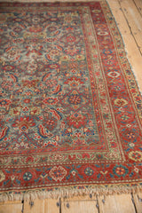 Antique Persian Malayer rug, Herati design in unusual hues, showing wear, foundation, tattered fringe.