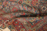 Worn pile of antique Malayer rug shows Herati design, slate blue and cherry red.