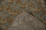 Distressed Vintage Bibikabad runner showing faded floral pile and sturdy hand-knotted foundation.
