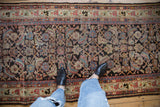 Detailed Herati pattern and floral borders of a vintage Mahal runner with time-softened pile.