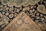 Distressed vintage Persian Malayer rug: navy, ivory, jade green floral pattern and tightly woven foundation.