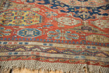 Intricate flatweave antique Caucasian Soumac border with wave motif, geometric patterns, red, blue, saffron.