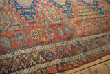 Antique Caucasian Soumac border detail: brick red zig-zag with germinating blossoms, wave motifs, and abrashes.