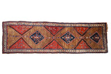Antique Azeri runner: camel, madder red, deep teal serrated diamond and floral motifs.