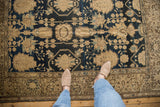Vintage Malayer rug with nuanced navy blue field, sand palmettes, and fine floral motifs.