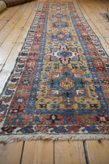 Low angle perspective of a vintage Karaja runner highlighting its length and geometric medallions.