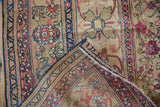 Folded corner of antique Kermanshah runner reveals finely reconditioned border and tight foundation.