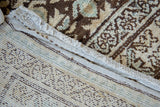 Hand-knotted foundation, intact selvage, and distressed pile of a Kurdish Hamadan rug.