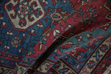 Rich texture and jewel tones of a vintage Northwest Persian rug's hand-knotted pile.