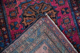 Hand-knotted reverse of Vintage Lilihan runner, original selvage, and raspberry red pile.