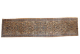 Vintage tea-washed Meshed runner with a floral and paisley design in camel, blue, and brown.