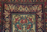 Antique Kermanshah rug detail: Shadow Samovar design with vinery in cochineal red, navy.