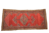 Vintage Camel Hair Serab runner with a hexagonal medallion on an abrashed red field.