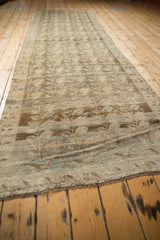 Distressed vintage Karabagh runner close-up, vertical vines, abrashed field, pale coffee, silver, blue, blush, ivory pile.