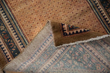 Distressed vintage Hamadan rug pile showing wear and detailed hand-knotted foundation.