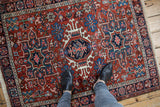 Overhead perspective of a vintage Karaja rug demonstrating its scale and intricate geometric pattern.