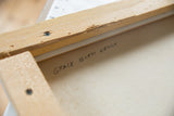 Artist Grace B. Keogh's hand-written signature on the unpainted reverse of the natural beige canvas.