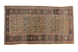 Antique hand knotted Kurdish Bijar rug, late 19th century, with henna plant motif on ochre yellow field.