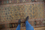 Antique Kurdish Bijar rug, ochre yellow field with henna plant motif, natural shades, and even wear.