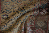 Aged ochre field, visible knot heads, and henna plant motif on antique Kurdish Bijar rug.