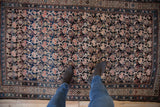 Vintage Kurdish rug, intricate boteh lattice in navy and blush, with even pile wear and scale.