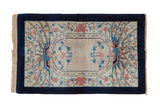 Vintage Art Deco rug with a pictorial double phoenix design, central medallion, and cobalt blue border.