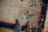 Antique Art Deco carpet: silver field, blue and coral border, florals, frayed selvage.