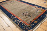 Antique Fetti-Li Chinese rug corner: cobalt, coral, bird, floral patterns. Tattered fringe.