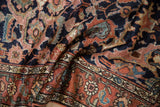 Even, hand-knotted pile of a collector Kurdish rug with expressive floral arabesques.