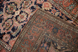 Close view of the antique Kurdish rug's secured side cord selvage and hand-knotted construction.